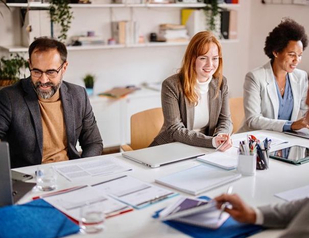 people collaborating around a conference room table