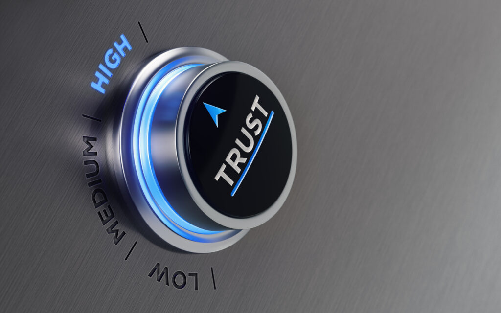Dial with the word "Trust" on it in a high position as opposed to medium or low. High trust for resilient technology